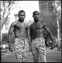 Alphonso Stewart and Khrist Newman, "The Positive Brothers", acrobats and street artists, in Battery Park where they regularly perform